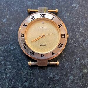 Vintage Gucci Women’s Gold Watch Face with Roman Numerals